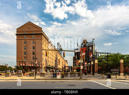 Baltimore, Maryland, USA - July 11, 2017: A view of Eutaw Street between B&O Warehouse and Oriole Park at Camden Yards. Camden Yards was the first of  Stock Photo