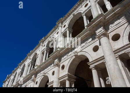 Wonderful Basilica Palladiana marble arches (16th-17th century) in Vicenza with blue sky, designed by the famous renaissance architect Andrea Palladio Stock Photo