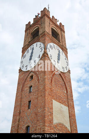 MONDOVI, ITALY - AUGUST 18, 2016: Belvedere ancient clock tower low angle view in a summer day in Mondovi, Italy. Stock Photo