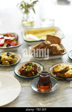 Turkish breakfast with various plates on a table Stock Photo