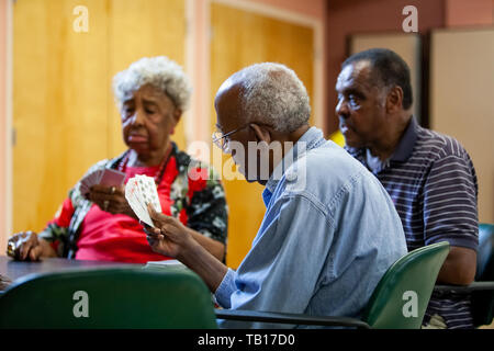 African American seniors playing cards at a senior center in Ardmore PA Stock Photo
