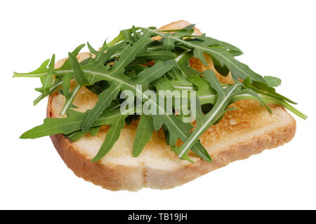 Sandwich toast with fresh arugula vegetable grass. Isolated  on white studio macro Stock Photo