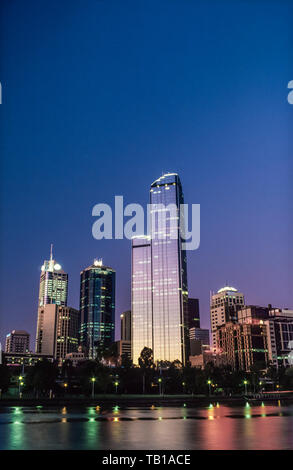 The Rialto building at dusk, with the Yarra river in foreground, Melbourne, Victoria, Australia Stock Photo