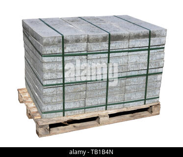 Stacks of new concrete paving slabs on wooden palette. Isolated on white  with patch Stock Photo
