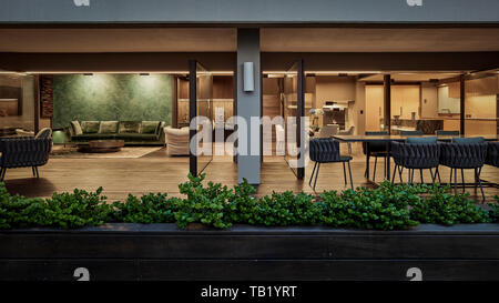 Looking inside from outdoor terrace area. Elizabeth Bay Apartment, Elizabeth Bay, Australia. Architect: Rolf Ockert Architect, 2019. Stock Photo