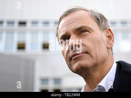 04 February 2019, Baden-Wuerttemberg, Stuttgart: Oliver Blume, CEO of Porsche AG, is standing in front of the carmaker's headquarters in Stuttgart-Zuffenhausen, where an information event for all employees of Porsche AG is to take place. Photo: Marijan Murat/dpa | usage worldwide Stock Photo