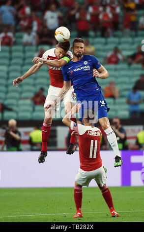 Baku, Azerbaijan. 29th May, 2019. Olivier Giroud (R, top) of Chelsea vies with Laurent Koscielny (L, top) of Arsenal during the UEFA Europa League final match between Chelsea and Arsenal in Baku, Azerbaijan, May 29, 2019. Chelsea won 4-1. Credit: Tofik Babayev/Xinhua/Alamy Live News Stock Photo