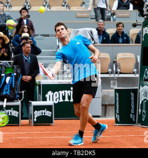 30 May 2019, France (France), Paris: Tennis: Grand Slam/ATP-Tour, French Open, singles, men, 2nd round, Thiem (Austria) - Bublik (Kazakhstan): Dominik Thiem from Austria hits a ball into the audience. Photo: Frank Molter/dpa Stock Photo