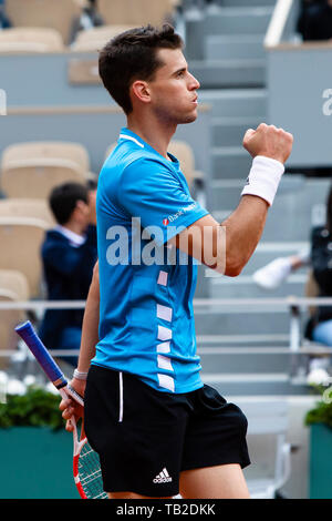 30 May 2019, France (France), Paris: Tennis: Grand Slam/ATP-Tour, French Open, singles, men, 2nd round, Thiem (Austria) - Bublik (Kazakhstan): Dominik Thiem from Austria cheers after winning the match. Photo: Frank Molter/dpa Stock Photo