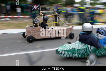 Osnabrück, Lower Saxony, Germany A soapbox in the shape of a pirate ship drives on a street during a soapbox race. Drivers take part in the race in homemade cars. Photo: Friso Gentsch/dpa Credit: dpa picture alliance/Alamy Live News Stock Photo