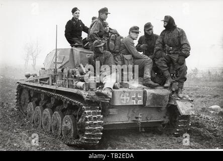 Wiking Division SS Grenadiers ride on Panzer 1942 Stock Photo