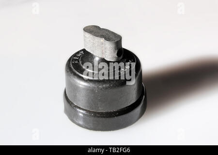 Antique switch on off bakelite, isolated on white background, close-up Stock Photo