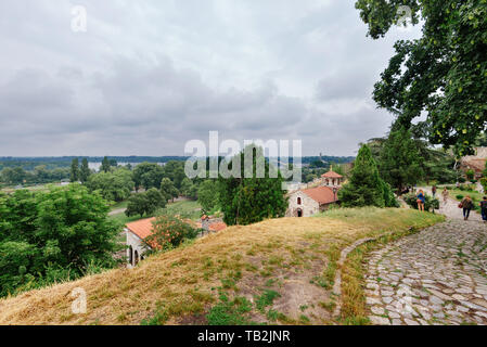 Belgrade, Serbia - June 16, 2018. Belgrade fortress Kalemegdan, fortification wall with Ruzica Church building and trees. Serbian medieval citadel, to Stock Photo