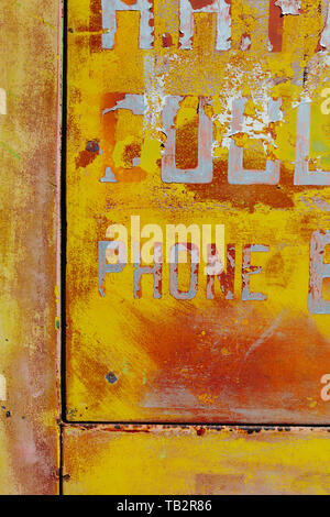 Peeling lettering and paint on side of old, abandoned truck Stock Photo
