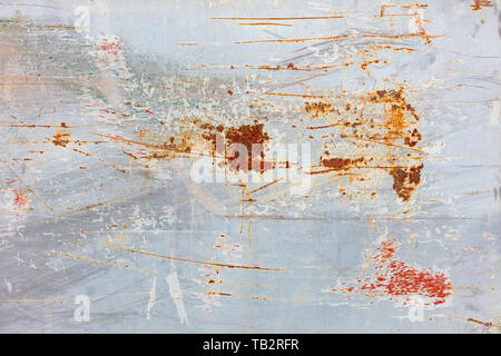 Scratch and rust markings on old metal wall Stock Photo