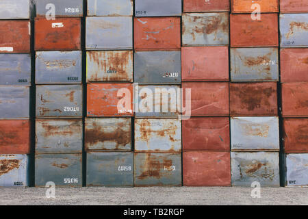 Stack of rusty metal containers Stock Photo
