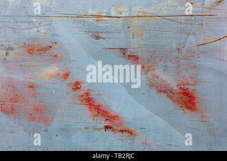 Scratch and rust markings on old metal wall Stock Photo