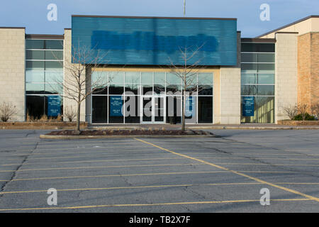 The outline of a logo sign outside of a closed Pier 1 Imports retail store location in Boucherville, Quebec, Canada, on April 21, 2019. Stock Photo