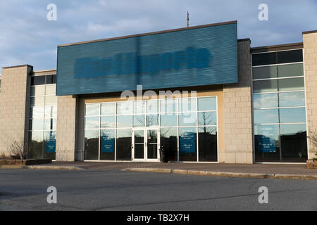 The outline of a logo sign outside of a closed Pier 1 Imports retail store location in Boucherville, Quebec, Canada, on April 21, 2019. Stock Photo