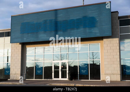 The outline of a logo sign outside of a closed Pier 1 Imports retail store location in Boucherville, Quebec, Canada, on April 21, 2019. Stock Photo