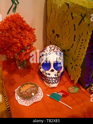 Closeup of decorations and offerings on a Mexican Day of the Dead altar Stock Photo