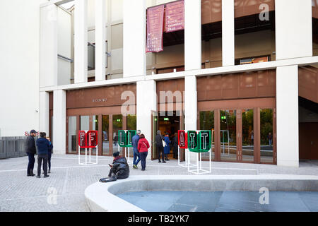 TURIN, ITALY - NOVEMBER 2, 2018: FLAT, art book fair entrance with people at Nuvola Lavazza building in Turin, Italy. Stock Photo