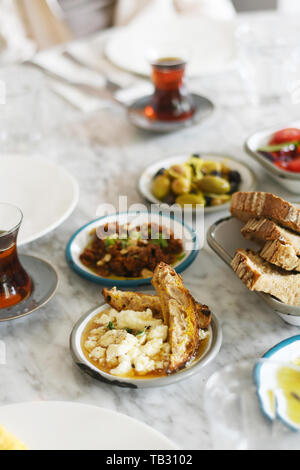 Turkish breakfast with various plates on a table Stock Photo