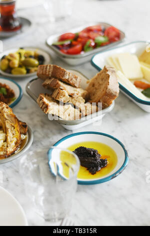 Turkish breakfast with various plates on a table Stock Photo