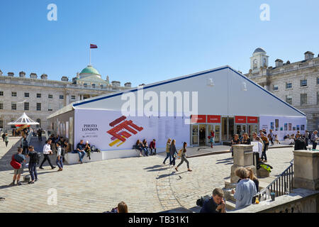 LONDON - MAY 16, 2019: Photo London, photography art fair at Somerset House with visitors in a sunny day in London, England. Stock Photo