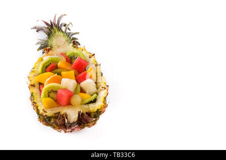 Mix fruit served inside pineapple isolated on white background Stock Photo
