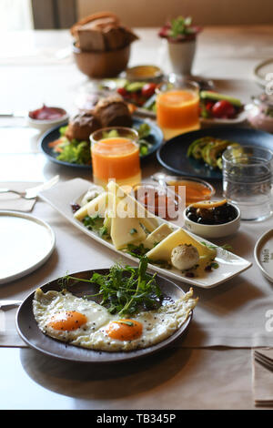 Turkish breakfast with various plates on a table Stock Photo
