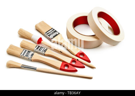 Set of painting brushes and masking tapes on white isolated with clipping path Stock Photo