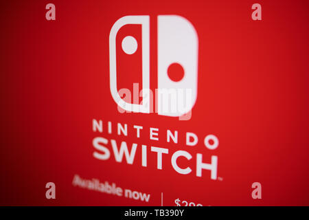 Prague - May, 21, 2019: Closeup on Nintendo switch logo photographed from the site screen. Stock Photo