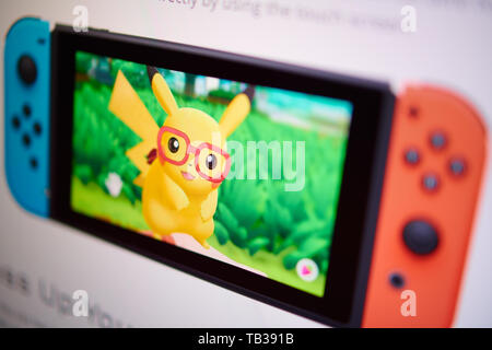 Prague - May, 22, 2019: Closeup on Pikachu on Nintendo Switch video game console photographed from the site screen. Stock Photo