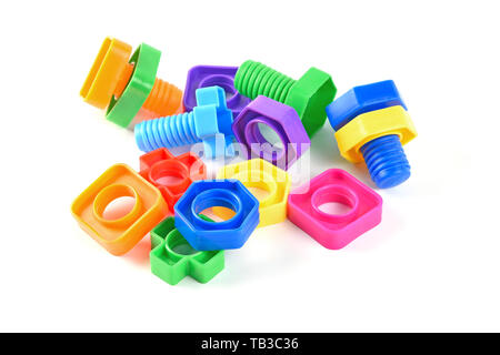 Set of Colorful Plastic Screw and Bolts as Child Toys. Isolated on White Background Stock Photo