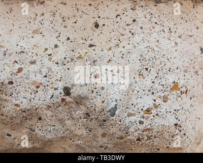 Concrete texture with exposed gravel stones. Background concept. Stock Photo