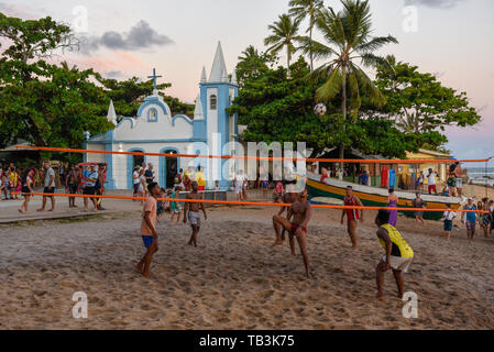 Praia do Forte, Brazil - 31 January 2019: people playing footvolley at Praia do Forte on Brazil Stock Photo