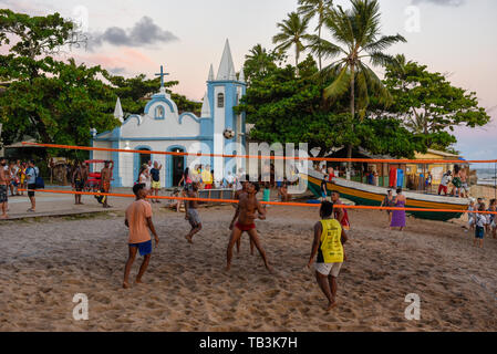 Praia do Forte, Brazil - 31 January 2019: people playing footvolley at Praia do Forte on Brazil Stock Photo