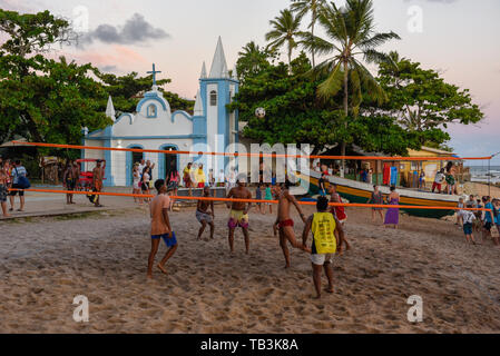 Praia do Forte, Brazil - 31 January 2019: people playing footvolley at Praia do Forte on Brazil Stock Photo