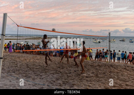 Praia do Forte, Brazil - 31 January 2019: people playing footvolley at Praia do Forte on Brazil Stock Photo