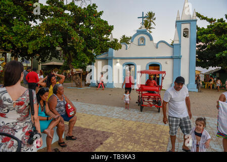 Praia do Forte, Brazil - 31 January 2019: people visiting the colonial church of mainly square in the Praia do Forte on Brazil Stock Photo