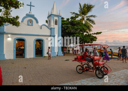 Praia do Forte, Brazil - 31 January 2019: people visiting the colonial church of mainly square in the Praia do Forte on Brazil Stock Photo