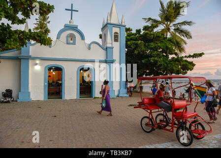 Praia do Forte, Brazil - 31 January 2019: people visiting the colonial church of mainly square in the Praia do Forte on Brazil Stock Photo