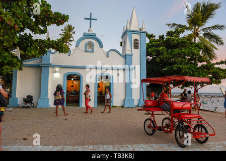 Praia do Forte, Brazil - 31 January 2019: people visiting the colonial church of mainly square in the Praia do Forte on Brazil Stock Photo