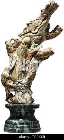 A Chinese carved coral branch, 19th century, A white coral branch, with a green coating in places, depicting the deity Shouxing in half relief carving below a heron in flight (both symbols of longevity). Mounted on a round, greyish-green marble pedestal, tapering in the middle. Total height 45 cm. China, Chinese, historic, historical 19th century, Additional-Rights-Clearance-Info-Not-Available Stock Photo