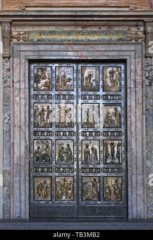 Vatican - October 26, 2009: The Holy Door at Saint Peter Cathedral in Vatican City. Stock Photo
