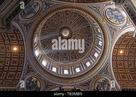 Vatican - October 26, 2009: Ceiling and Dome Interior at Saint Peter Cathedral in Vatican City. Stock Photo