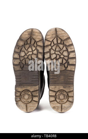 Sole bottom of a pair workboots with acid and oil resistance ability. Isolated on white background Stock Photo