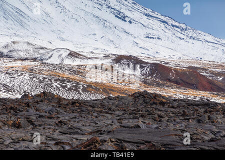 Snow- capped Mount volcanoes, volcanic massive, one of the volcanic complex on the Kamchatka Peninsula in the far east of Russia. Pacific ring fire. Stock Photo