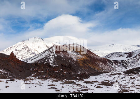 Snow- capped Mount volcanoes, volcanic massive, one of the volcanic complex on the Kamchatka Peninsula in the far east of Russia. Pacific ring fire. Stock Photo